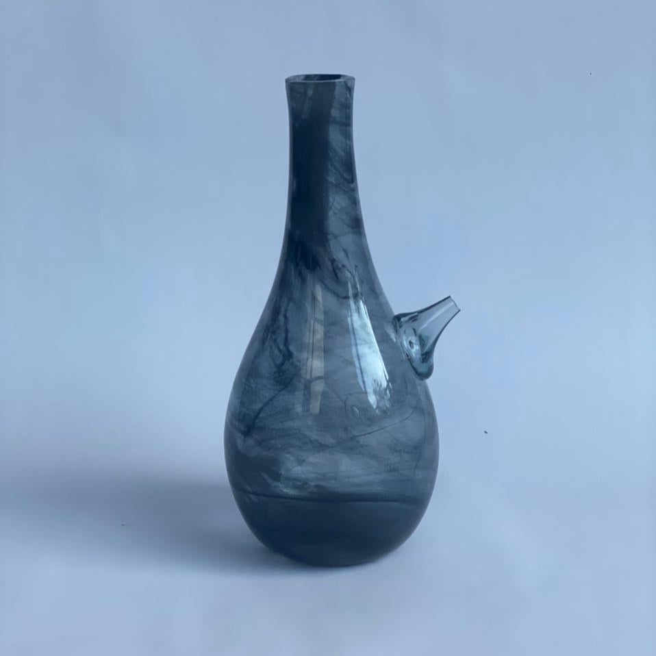 Introducing our modernized Ibrik – a fusion of Lebanese tradition and contemporary design. This versatile piece pays homage to the rich cultural heritage of Lebanon while seamlessly integrating into the modern lifestyle. Crafted with precision, it serves as a unique vase or liquid jug, adding an eclectic touch to your space.