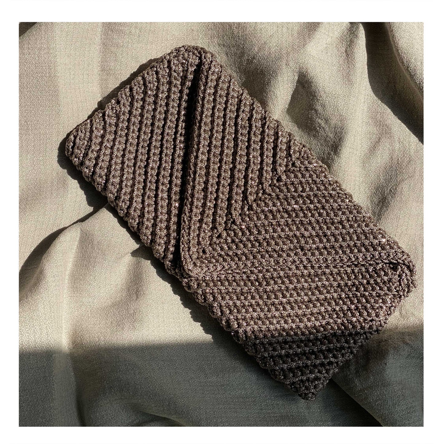 Handmade crochet bag in vibrant colors, showcasing intricate craftsmanship inspired by Lebanese artistry. A unique and sustainable accessory from Dhalu World, adding a touch of warmth and cultural richness to your style