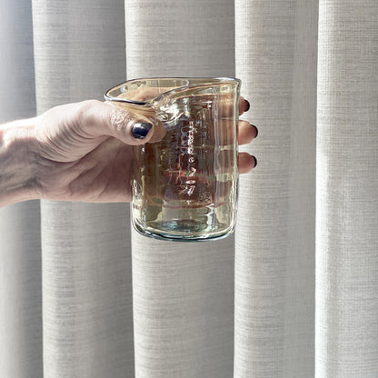 Introducing our innovative Lip Cup, thoughtfully crafted in Lebanon from recycled glass. Experience the perfect blend of style and comfort as each cup comes equipped with a uniquely designed handle for a cozy and ergonomic grip.