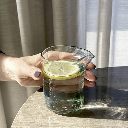 Introducing our innovative Lip Cup, thoughtfully crafted in Lebanon from recycled glass. Experience the perfect blend of style and comfort as each cup comes equipped with a uniquely designed handle for a cozy and ergonomic grip.