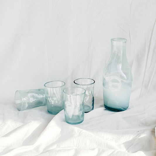 Elevate your sipping experience with our Deformed White Arak Mini Cups, exquisite blown glass creations proudly crafted in Lebanon. Each mini cup brings joy and charm to your table.